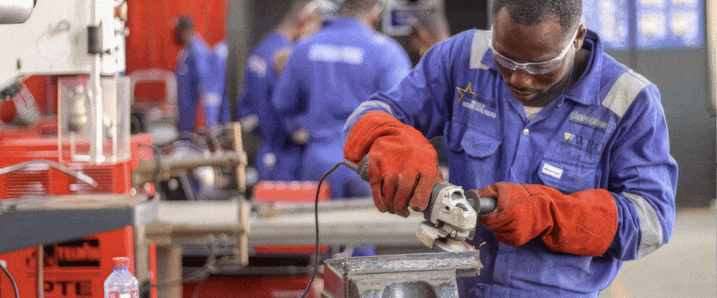 freepik__closeup-shot-a-skilled-worker-in-safety-gear-metic__14000-ezgif.com-optimize